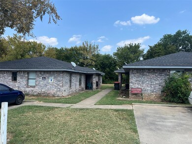 View of property exterior with a yard