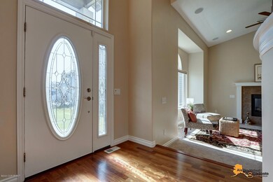 Inviting foyer w/oak hardwood floors