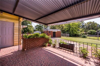 Wonderful back porch and fenced in backyard!