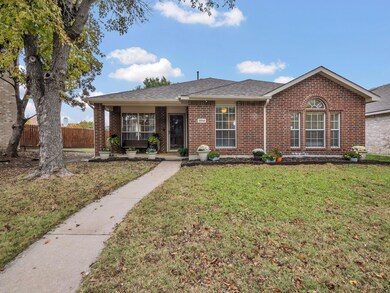 Ranch-style house with a front lawn