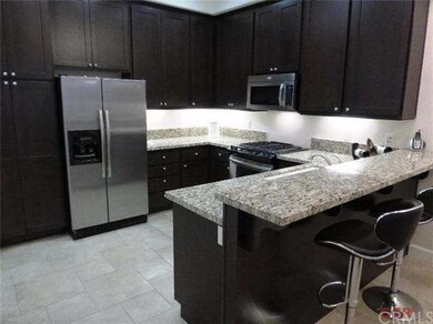 Gourmet kitchen with stainless steel appliances, m