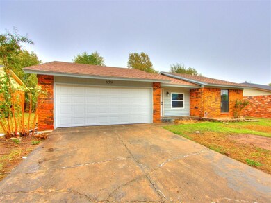 Single story home with a garage