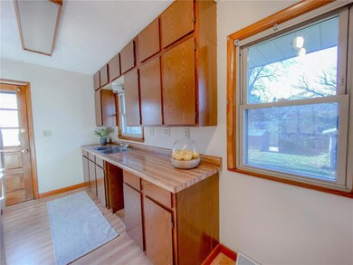 Kitchen sinks looks out to large backyard.