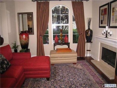 Living  Room with Hi Ceilings and Arched Window pl