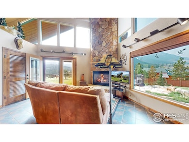 Beautiful tile flooring and windows galore.