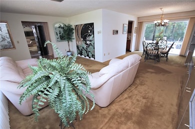 Living room looking into dining area