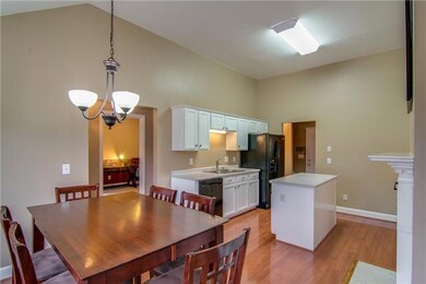 Enjoy the eat-in kitchen while with lots of natural light and a view of the back yard.