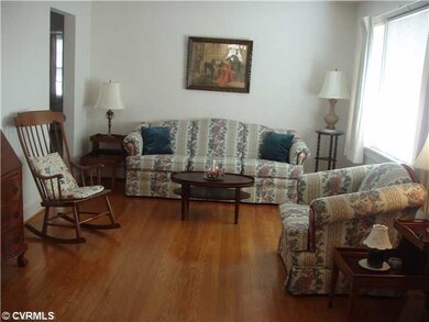 Living Room - Living Room with Hardwood Floors ope