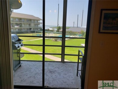 View from Master BR to screened porch, pool and ri