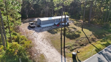 276 Twin Lakes Rd, Eastpoint, FL 32328 - photo 2