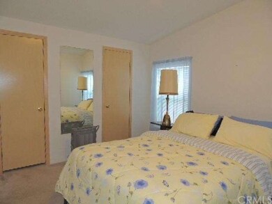 Master bedroom with his and hers closets.