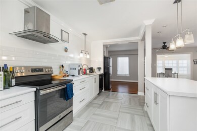 Kitchen comes with a big granite island and stainl