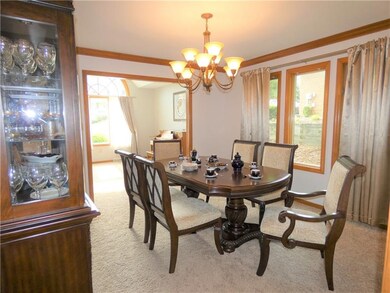 Adjacent to the kitchen is your light bright and airy formal dining room.