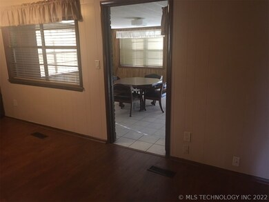 Sun porch has A/C and right off the kitchen area a