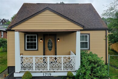Front porch with hand crafted railings. Front porc