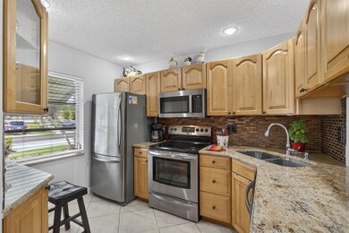 3402 Theo Way, West Palm Beach, FL 33417 - photo 6