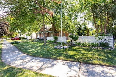 View of property hidden behind natural elements
