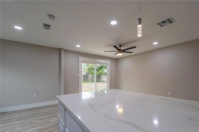 View of rear yard from kitchen