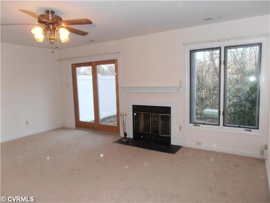 Living Room - woodburning fireplace with electric 
