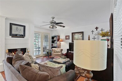The Family Room offers doors to the balcony and a 
