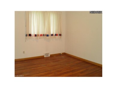 Three Bedrooms with Hardwood Floors.