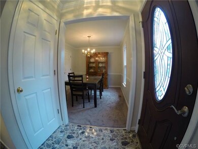 Entry way with BEAUTIFUL FRONT DOOR.