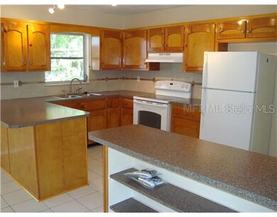 Kitchen - Remodeled kitchen with new appliances, new countertops, new faucet and new lighting