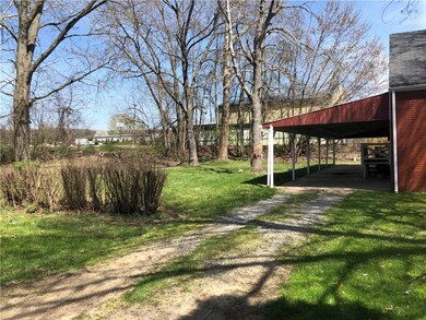 View of the backyard from the alley