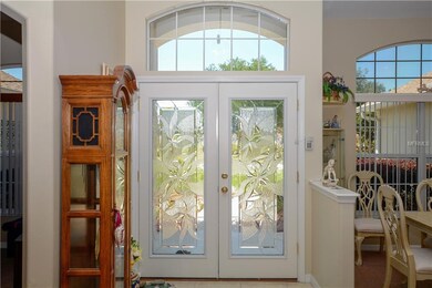 Foyer with beautiful full glass entry doors