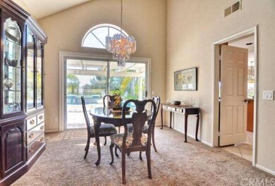 Formal Dining Room With Plenty Of Natural Light.