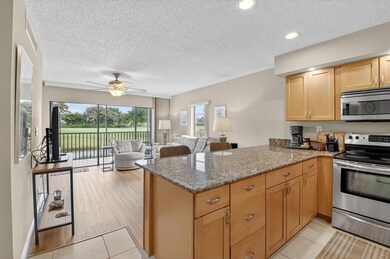 451 Greensward Ln unit 104B, Delray Beach, FL 33445 - photo 2