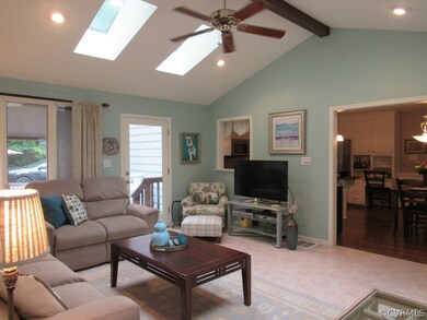 Vaulted great room/ family room opens into the upd