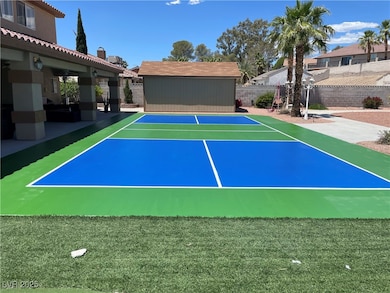 View of tennis court featuring basketball court, a