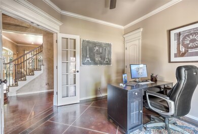 Office with closet and view to front yard, stained