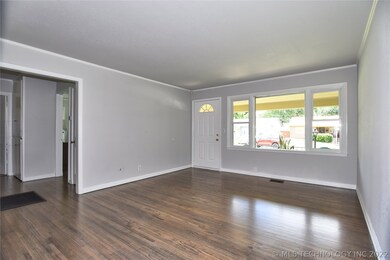 Freshly refinished wood floors and new interior pa