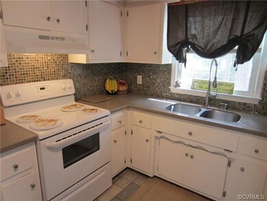 Closer Look at the Upgraded Glass Tile Backsplash,