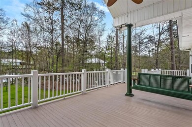 Swing on rear deck and wave hello to those idling