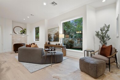 Living room featuring light wood-type flooring, r