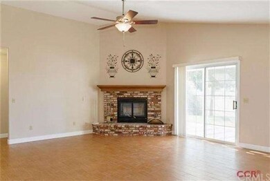 The family room is located just off of the kitchen
