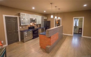 The heart of the home! The living area, walk-in pa