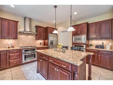 Kitchen. Rich Cabinetry & Granite Counters