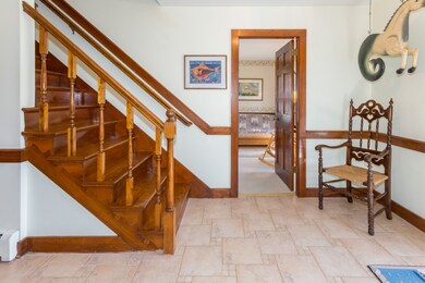 Bright and inviting formal foyer.