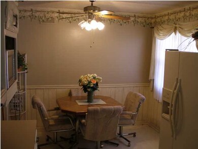Dining Area with Ceiling Fan and South Window