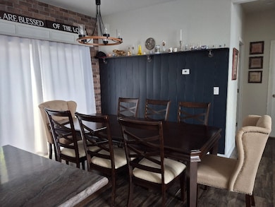 Dining room with wood finished floors