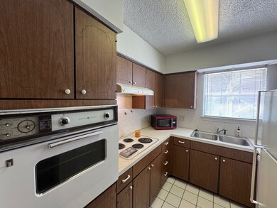 The vent hood over the cooktop vents to the outsid