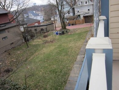 View of the Side yard from the 2nd floor porch.  1