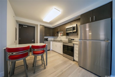 Kitchen utensils, cookware, dining room set included.