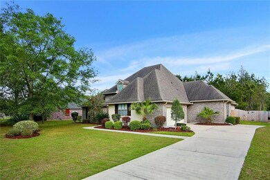 Beautifully landscaped in front and back yard. gut
