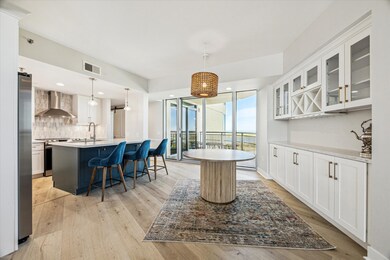 Recently renovated, the kitchen and dining area fl