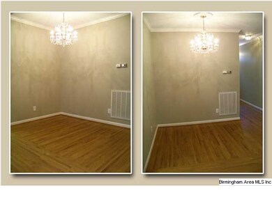 Dining area has a striking chandelier and more of 
